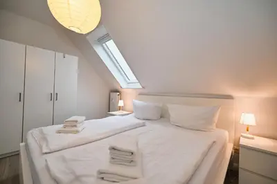 Ein Bett oder Betten in einem Zimmer der Unterkunft Küstennest