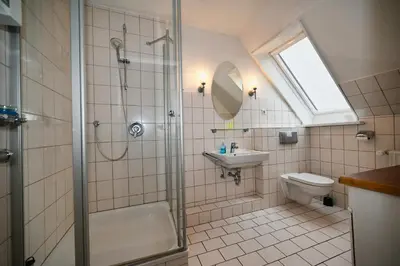 Ein Badezimmer in der Unterkunft Küstennest