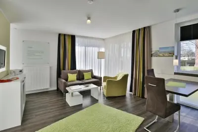 Ein Sitzbereich in der Unterkunft Duhner Strandhus, S14