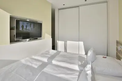 Ein Bett oder Betten in einem Zimmer der Unterkunft Duhner Strandhus, S14