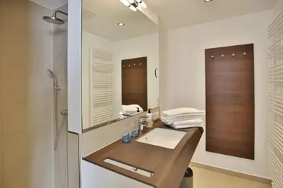 Ein Badezimmer in der Unterkunft Duhner Strandhus, S14