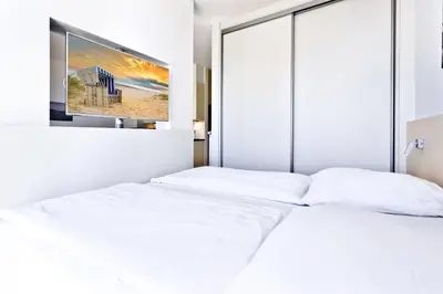 Ein Bett oder Betten in einem Zimmer der Unterkunft Alte Liebe, RA211