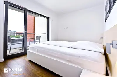 Ein Bett oder Betten in einem Zimmer der Unterkunft Alte Liebe, RA108