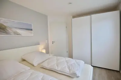 Ein Bett oder Betten in einem Zimmer der Unterkunft Meine See, MS3
