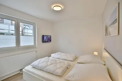 Ein Bett oder Betten in einem Zimmer der Unterkunft Meine See, MS3