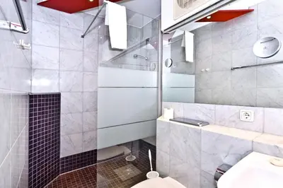 Ein Badezimmer in der Unterkunft Seeterrassen, ST36