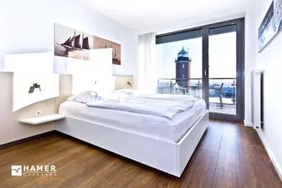 Ein Bett oder Betten in einem Zimmer der Unterkunft Alte Liebe, RA303