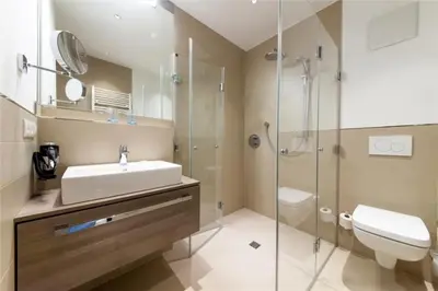 Ein Badezimmer in der Unterkunft Duhner Brandung, B2