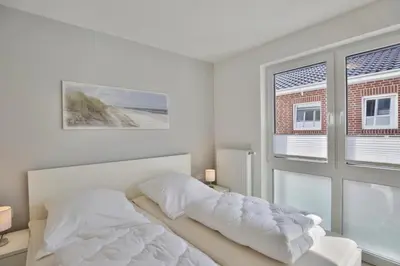 Ein Bett oder Betten in einem Zimmer der Unterkunft Meine See, MS6