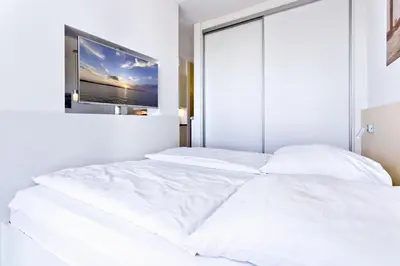 Ein Bett oder Betten in einem Zimmer der Unterkunft Alte Liebe, RA209