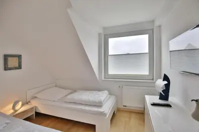 Ein Bett oder Betten in einem Zimmer der Unterkunft Dunamar, DM6