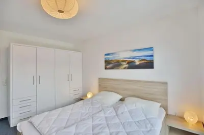 Ein Bett oder Betten in einem Zimmer der Unterkunft City Marina, CM18-6