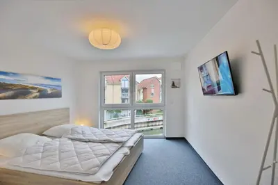 Ein Bett oder Betten in einem Zimmer der Unterkunft City Marina, CM18-6