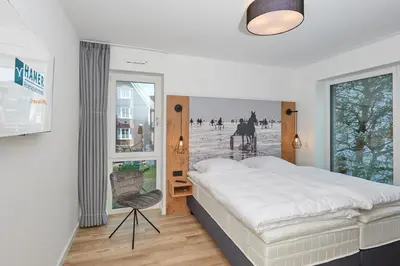 Ein Bett oder Betten in einem Zimmer der Unterkunft Nordstrand, N201a