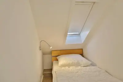 Ein Bett oder Betten in einem Zimmer der Unterkunft Hohe Worth, H409