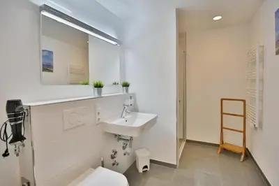 Ein Badezimmer in der Unterkunft Haus Marina, KM26
