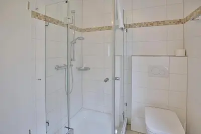 Ein Badezimmer in der Unterkunft Dunamar, DM4