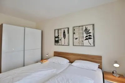 Ein Bett oder Betten in einem Zimmer der Unterkunft Dunamar, DM4