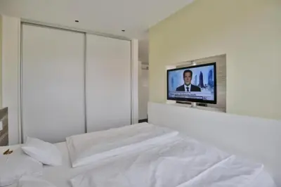 Ein Bett oder Betten in einem Zimmer der Unterkunft Duhner Strandhus, S203