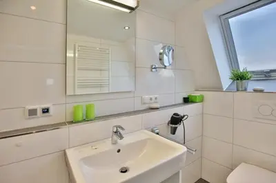 Ein Badezimmer in der Unterkunft Admiralsgarten, AG14b