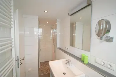 Ein Badezimmer in der Unterkunft Admiralsgarten, AG14b