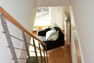 Ein Bett oder Betten in einem Zimmer der Unterkunft Duhner Brise, DB6