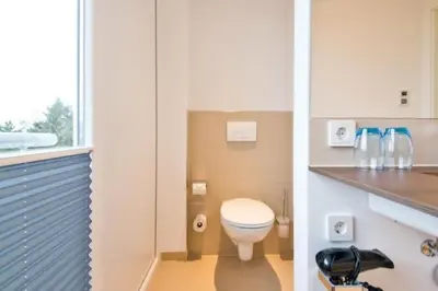 Ein Badezimmer in der Unterkunft Duhner Strandhus, S302
