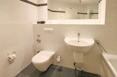Ein Badezimmer in der Unterkunft Residenz am Yachthafen, RY24