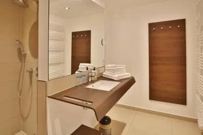 Ein Badezimmer in der Unterkunft Duhner Strandhus, S204