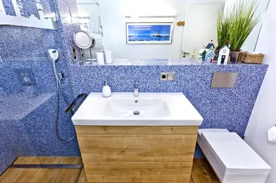 Ein Badezimmer in der Unterkunft Haus Yachthafen, KY6