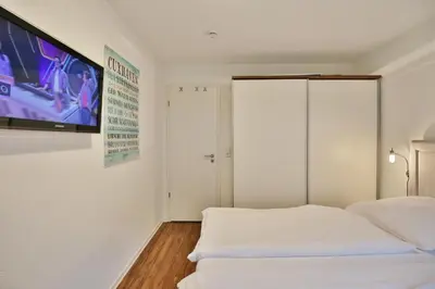 Ein Bett oder Betten in einem Zimmer der Unterkunft Ruge Bries, RB2