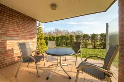 Ein Balkon oder eine Terrasse in der Unterkunft Wattwagen, RW3