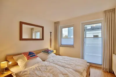 Ein Bett oder Betten in einem Zimmer der Unterkunft Ruge Bries, RB14