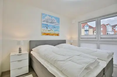 Ein Bett oder Betten in einem Zimmer der Unterkunft City Marina, CM18-3