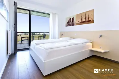Ein Bett oder Betten in einem Zimmer der Unterkunft Alte Liebe, RA304