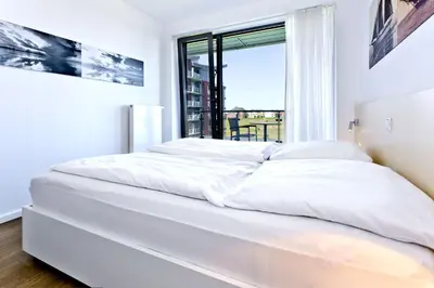 Ein Bett oder Betten in einem Zimmer der Unterkunft Alte Liebe, RA304