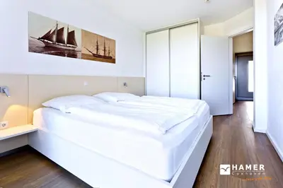 Ein Bett oder Betten in einem Zimmer der Unterkunft Alte Liebe, RA304
