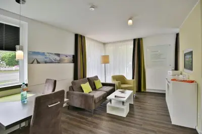 Ein Sitzbereich in der Unterkunft Duhner Strandhus, S1
