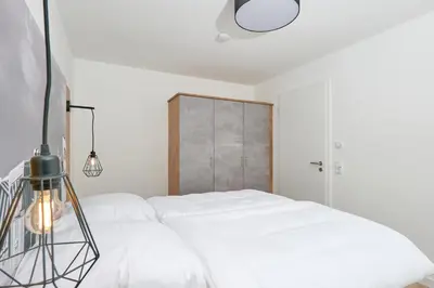 Ein Bett oder Betten in einem Zimmer der Unterkunft Nordstrand, N204
