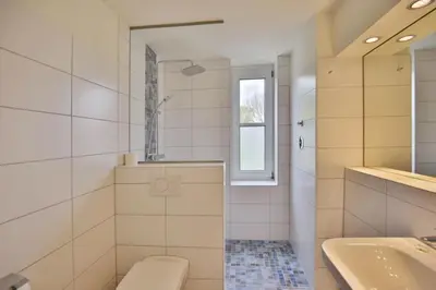 Ein Badezimmer in der Unterkunft Hohe Worth, H201