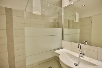 Ein Badezimmer in der Unterkunft Hohe Worth, H309