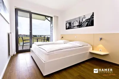 Ein Bett oder Betten in einem Zimmer der Unterkunft Alte Liebe, RA204