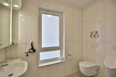 Ein Badezimmer in der Unterkunft Rugenbarg, RR4
