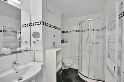 Ein Badezimmer in der Unterkunft Hohe Worth, H313