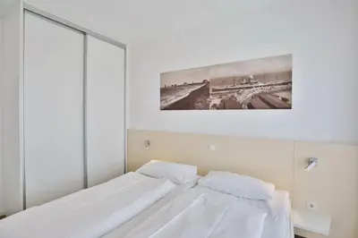 Ein Bett oder Betten in einem Zimmer der Unterkunft Alte Liebe, RA309