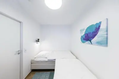 Ein Bett oder Betten in einem Zimmer der Unterkunft Hohe Worth, H305