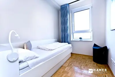 Ein Bett oder Betten in einem Zimmer der Unterkunft Döser Seedeich 7, SD9