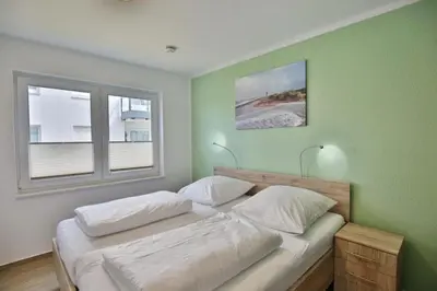 Ein Bett oder Betten in einem Zimmer der Unterkunft Admiralsgarten, AG1s