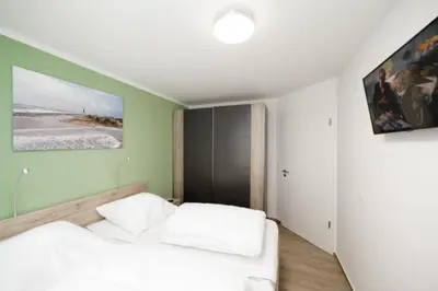 Ein Bett oder Betten in einem Zimmer der Unterkunft Admiralsgarten, AG1s