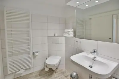 Ein Badezimmer in der Unterkunft Hohe Worth, H304